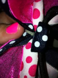 centerknotglueback 224x300 How To Make a Rockin Cheer Bow