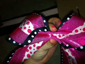 squish 300x224 How To Make a Rockin Cheer Bow